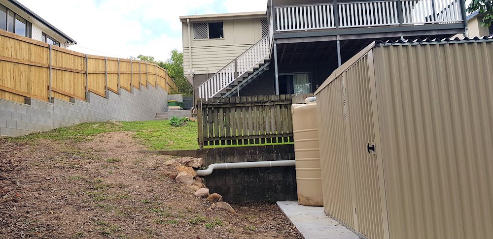 Looking towards the shed, fence and house.